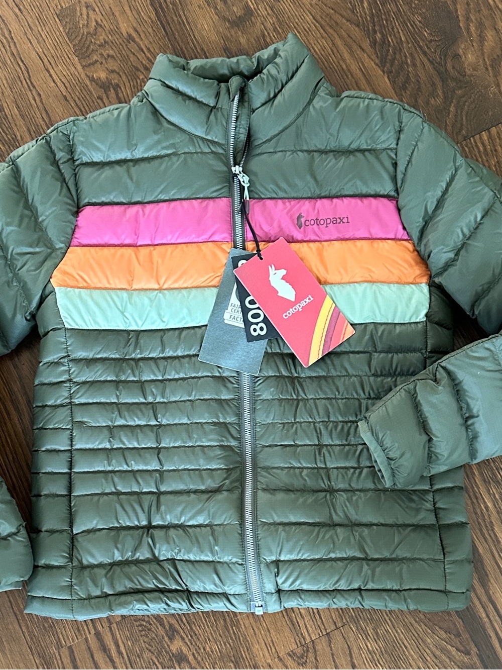Cotopaxi women’s Green Puffer Jacket with Color Stripe XS  NWT